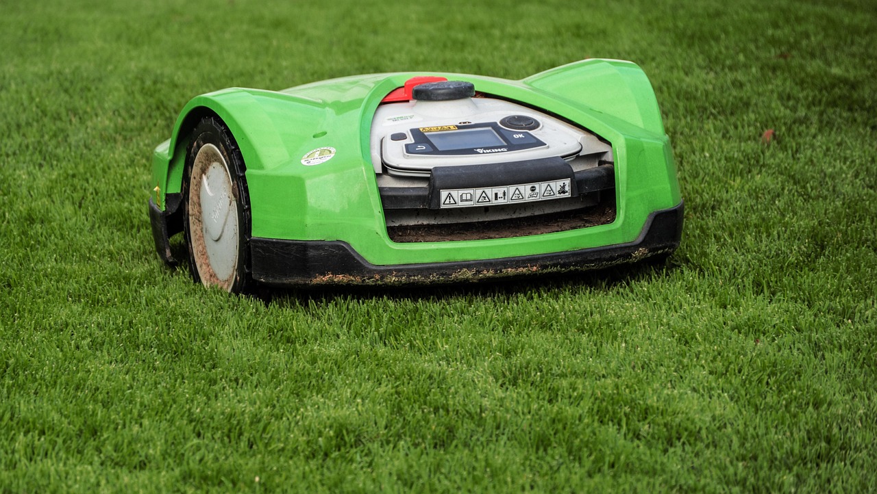 Robot gardener planting seeds in a field.