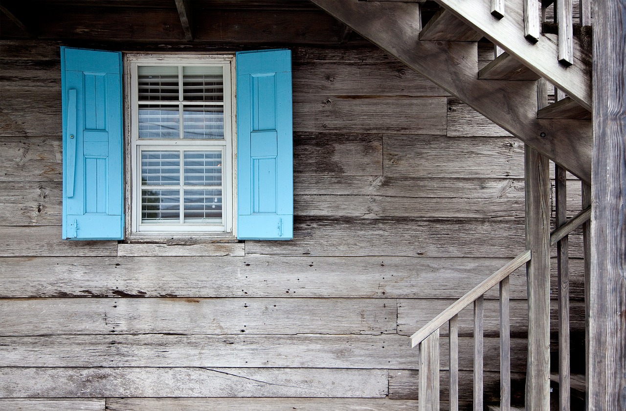 Light blue windows with modern decor accents.