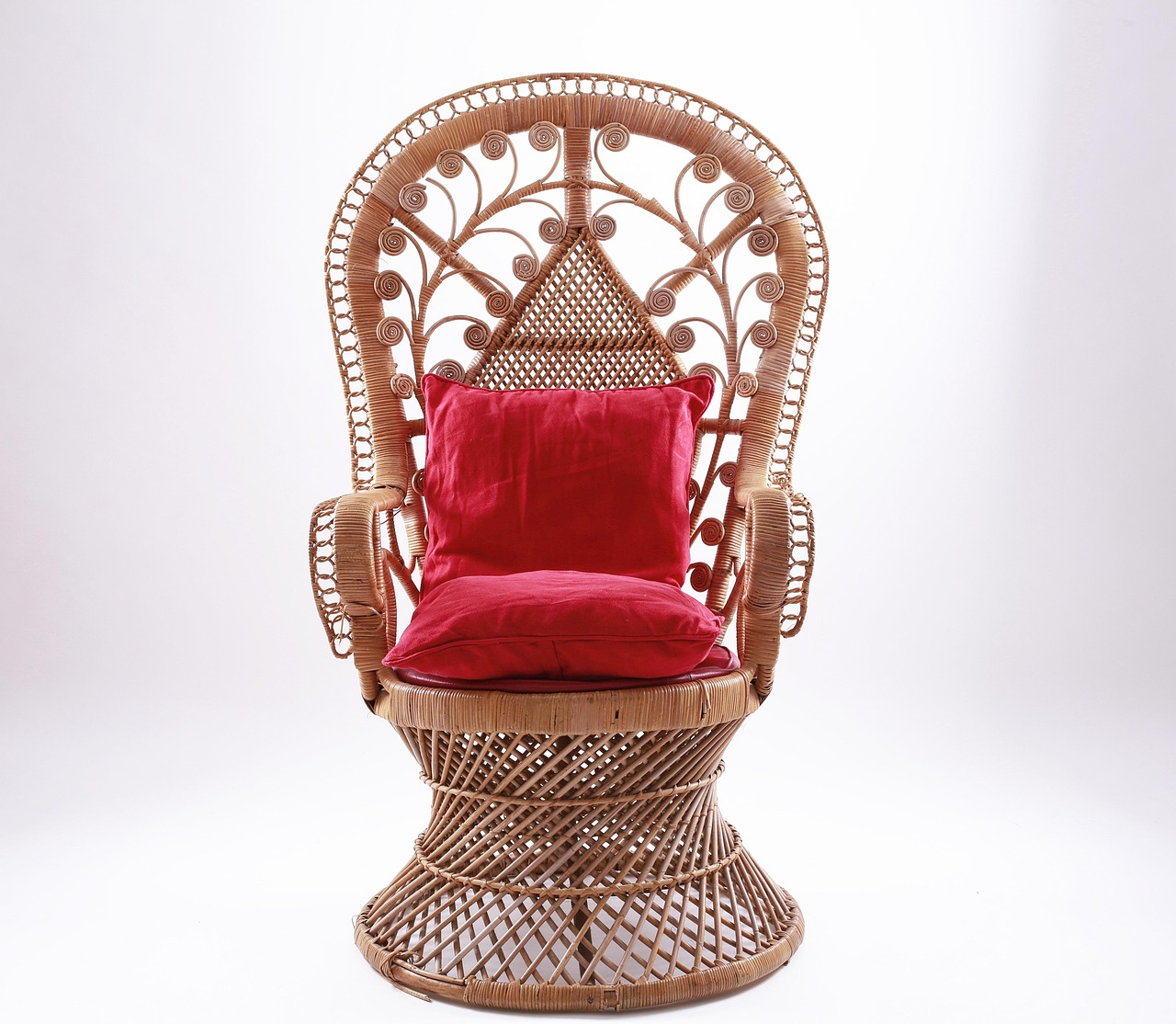 Wicker basket filled with folded linen fabrics. Wicker basket filled with folded linen fabrics.