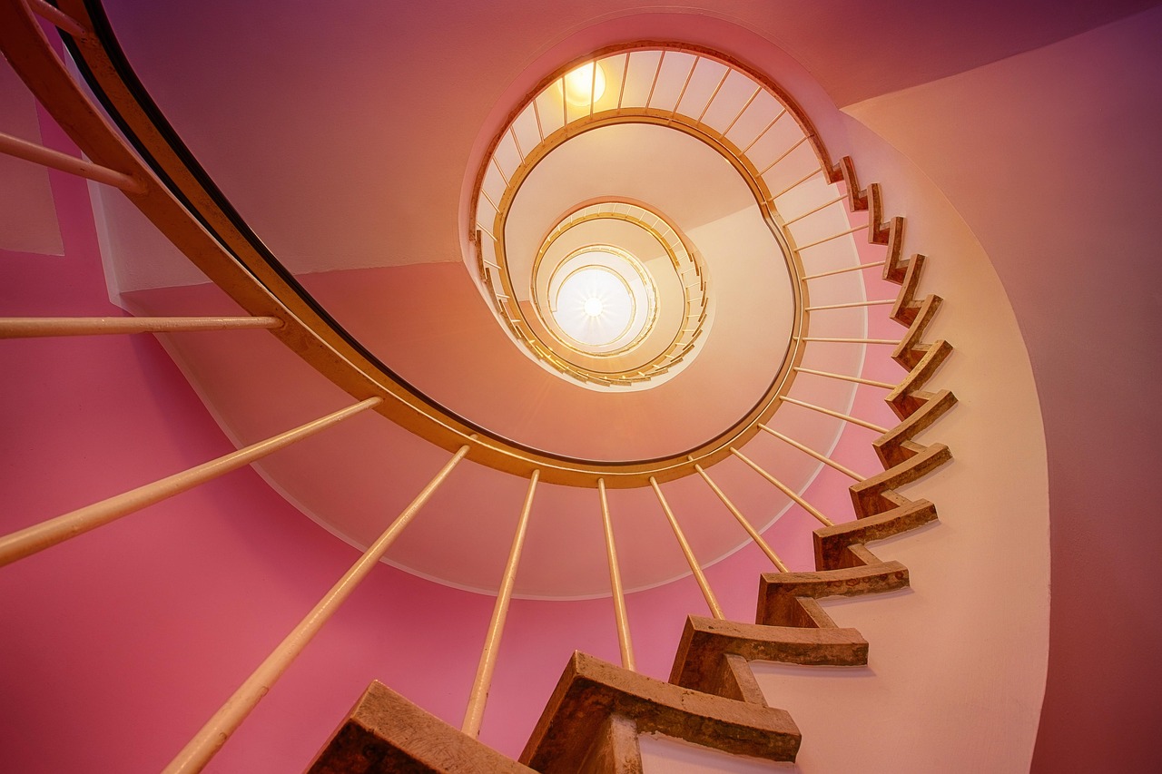 Modern staircase with stylish wooden railing. Modern staircase with stylish wooden railing.