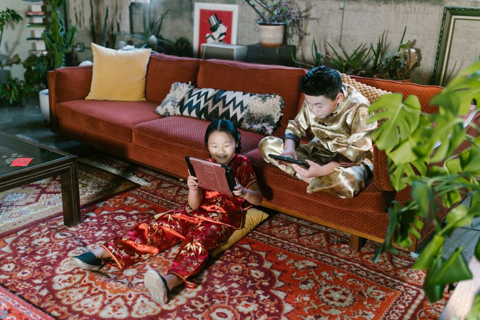 Colorful vintage Asian rug in cozy nook Colorful vintage Asian rug in cozy nook