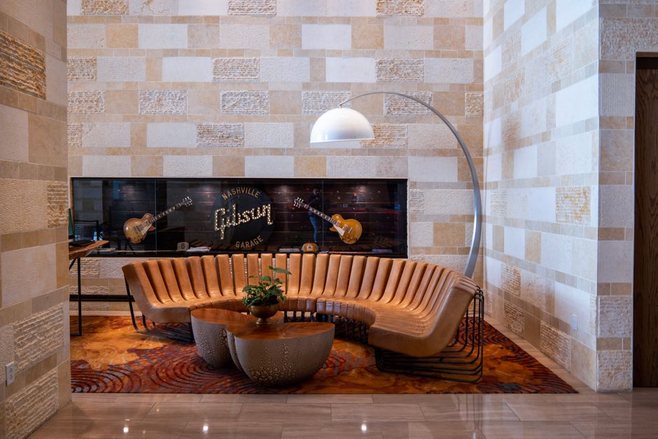 Cozy garage lounge featuring versatile summer furnishings Cozy garage lounge featuring versatile summer furnishings