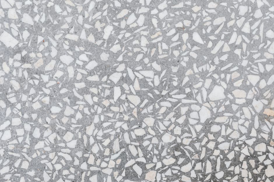 Modern summer kitchen with sleek terrazzo flooring.