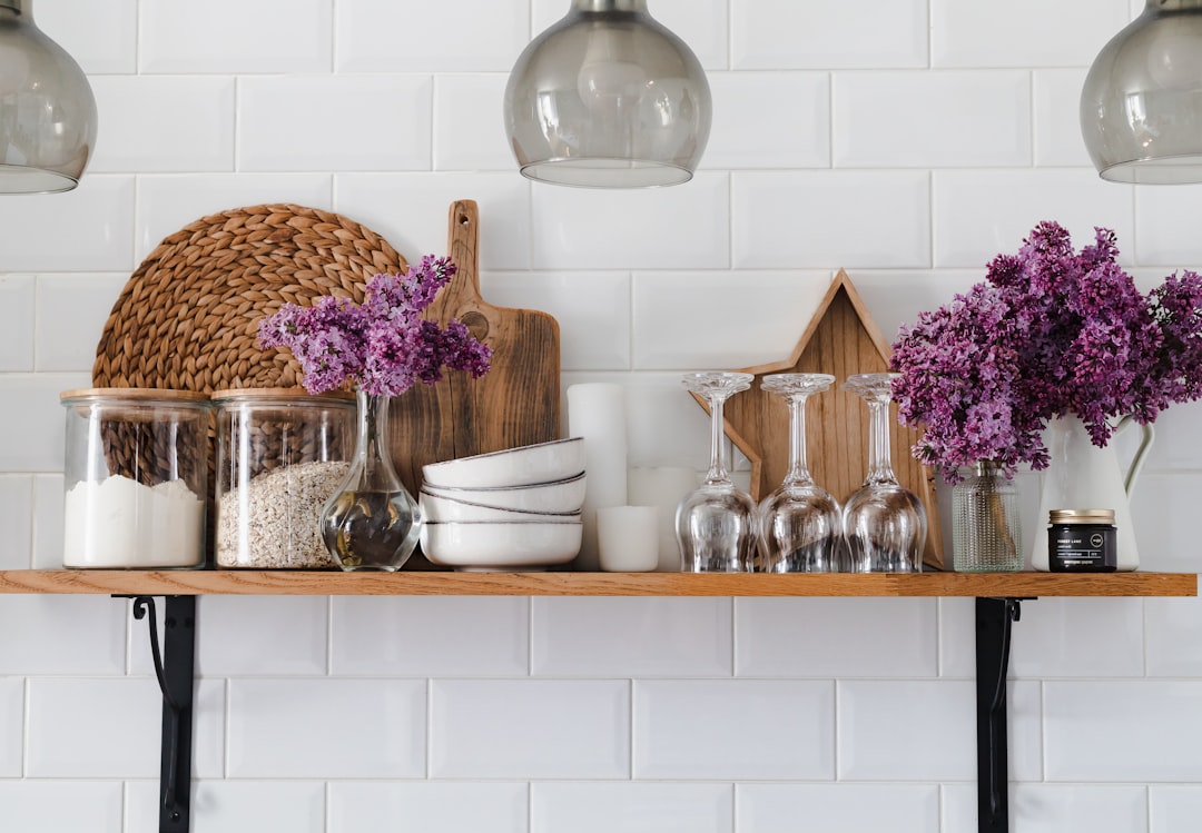 Glass vases add elegance to airy kitchen. Glass vases add elegance to airy kitchen.