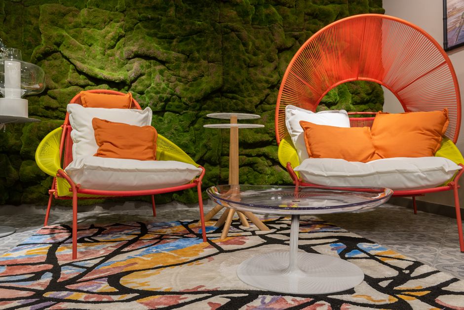 Elegant living room with neon color highlights.