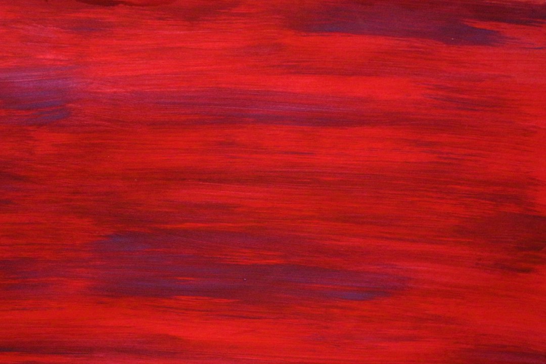 Burgundy and sienna art pieces on display. Burgundy and sienna art pieces on display.